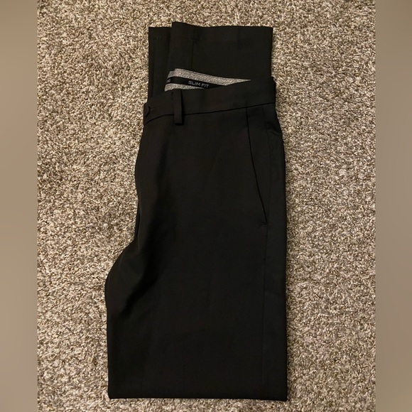 J.M. Haggar Tailored Fit 4-Way Stretch Flat Front Dress Pants - Haggar Pants | Jos A Bank